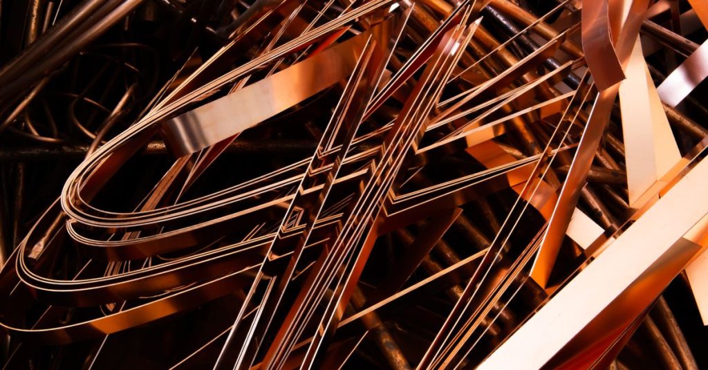Abstract depiction of shiny metal scraps, emphasizing recycling in an industrial theme.