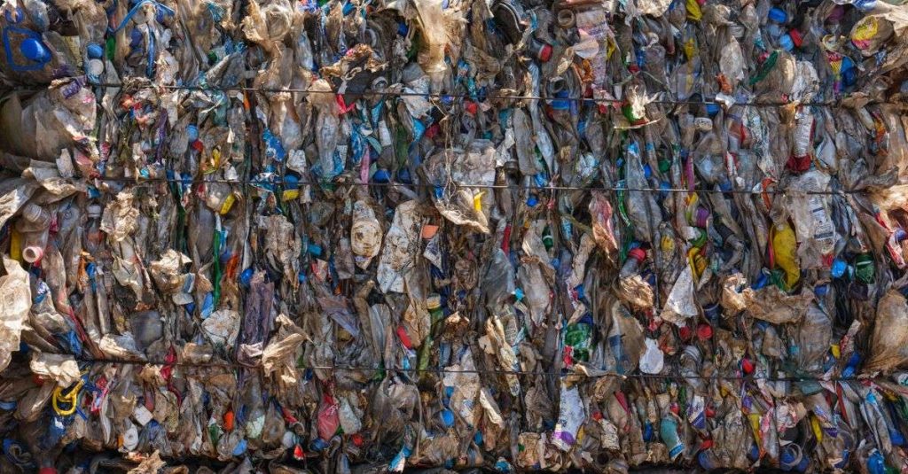 Baled plastic waste ready for recycling, highlighting environmental protection efforts.