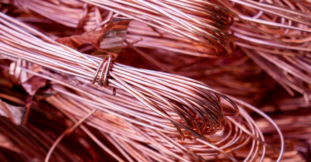 Trabzon Hurdacı Detailed view of copper wires showcasing metallic texture and recycling theme.
