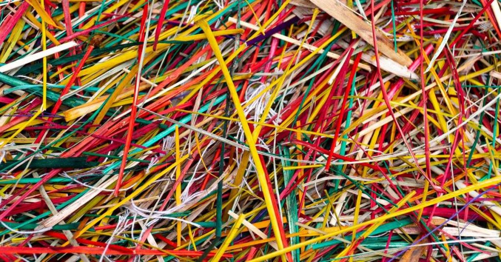 Vibrant multicolored straw textures showcasing Vietnamese craftsmanship.