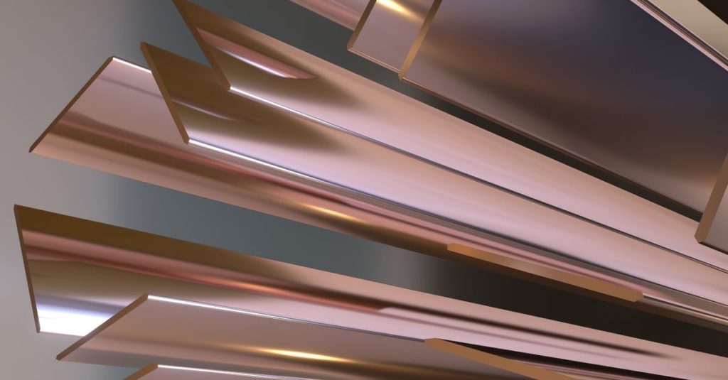 Dynamic abstract design featuring metallic geometric elements with a warm, golden tone.